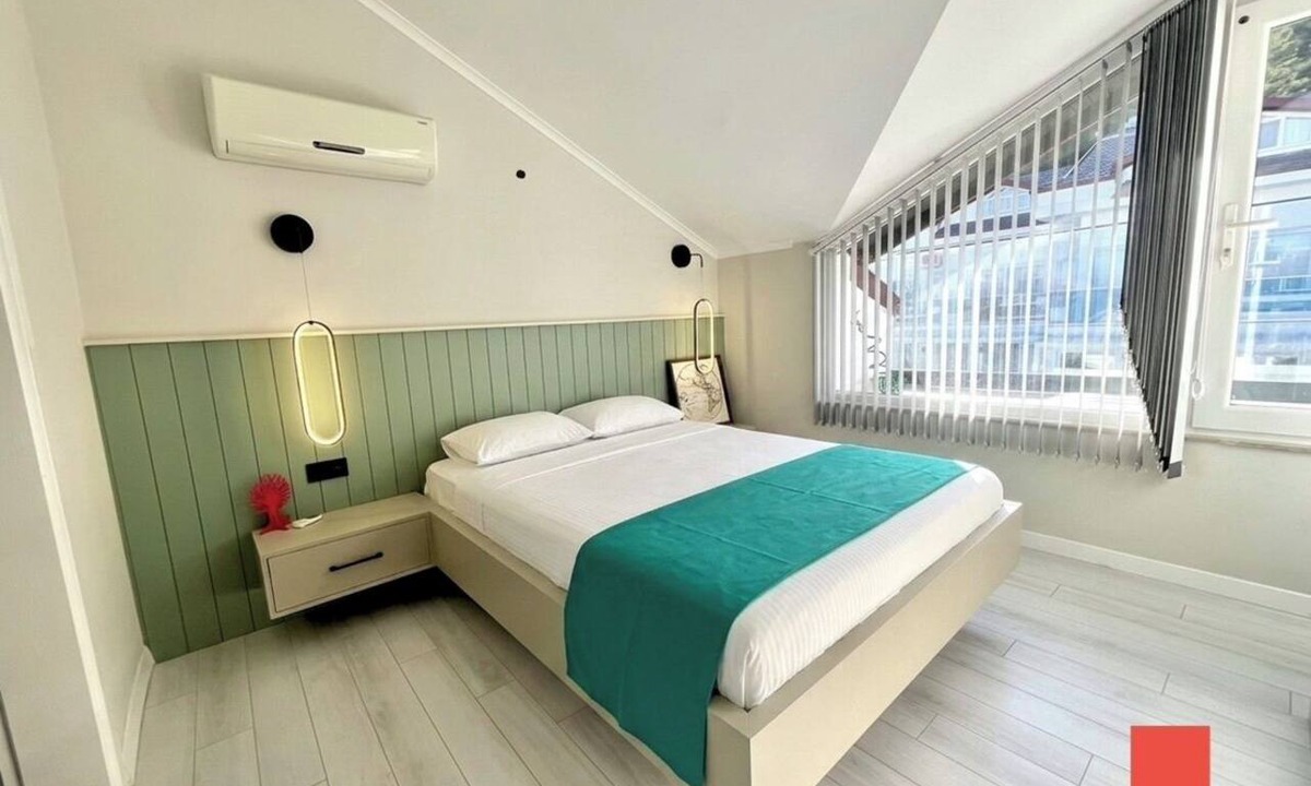 Fethiye Apartment | Pristine 2-bedroom holiday home with huge pool in Ölüdeniz
