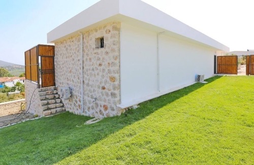 Patara Villa | A stunning contemporary villa with views towards the sea at Patara.