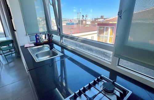 Cihangir Apartment | Charming terrace apartment in historic Istanbul with dreamy Bosphorus views.