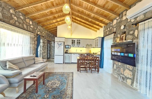 Fethiye House | Luxurious 2-bedroom stone villa with two pools, Turkish hamam & sauna