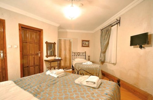 Goreme House | Nomads - Triple Room at the heart of Cappadocia