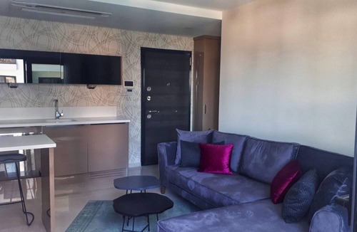 Kadnlar Denizi Mahallesi Apartment | One bedroom apartment in a Hotel concept with sea and pool view