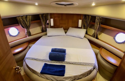 Bodrum City Center Boat Rental | Stay at a luxury crewed 2011 Azimut 55 Fly yacht in Bodrum 3 cabins for 6 guests