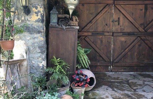 Kayakoy Cottage | Traditional stone cottage with stunning garden in historic Kaya village.