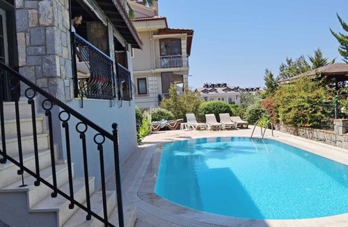 Oludeniz Villa | VİLLA DAİSY GARDEN perfectly situated with stunning views Babadağ