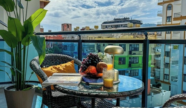 Apartment 1+1 Qoople Aria 32 in the center of Alanya in Antalya
