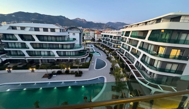 Modern Comfort in Oba: New 1+1 Apartment in Sol Garden in Alanya