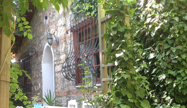 Traditional stone cottage with stunning garden in historic Kaya village. in Kayakoy