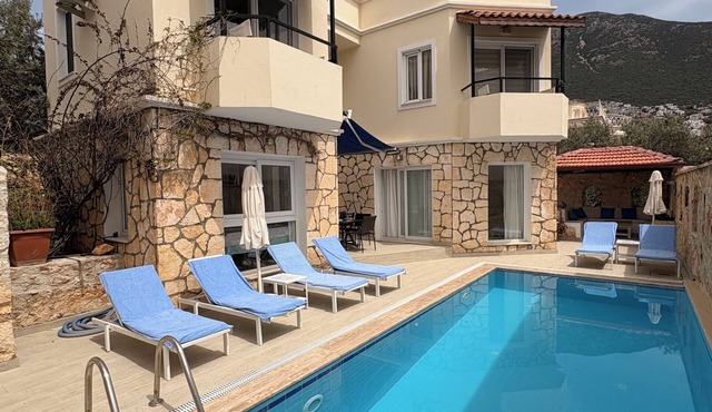 Villa Sari is off "Kalamar Rd ", a lovely 6 minute stroll to the Old Town in Kalkan