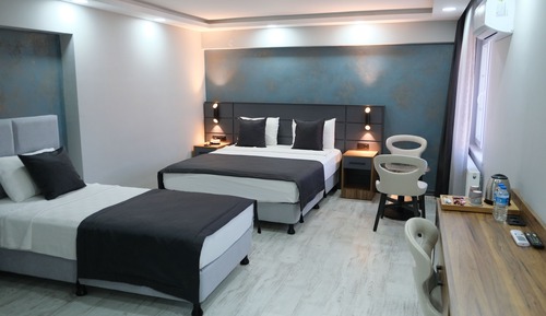 Deluxe Triple Room
