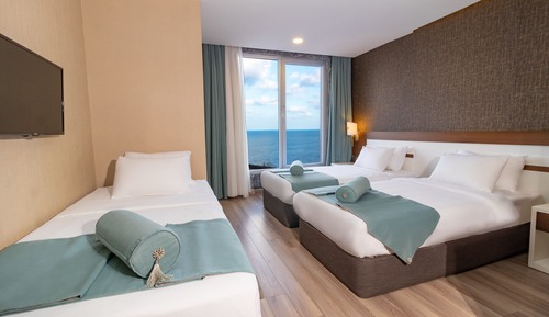 Deluxe Triple Deniz Manzarali Oda