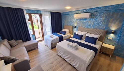 Deluxe Quadruple Room