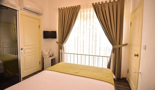 Economy Room, Balcony, Garden View