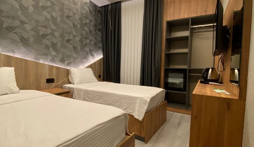 Deluxe Triple Room, City View