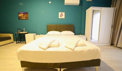 Superior Triple Room, Balcony, Garden View