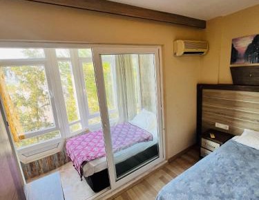 Double Room (1 Adult + 1 Child)