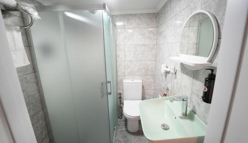Quadruple Room with Private Bathroom