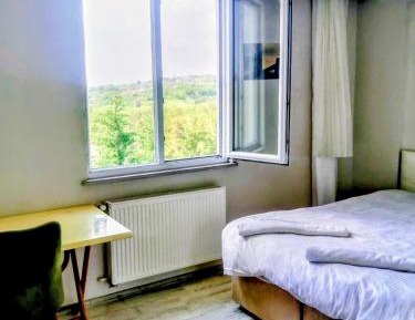 Quadruple Room with Shared Bathroom