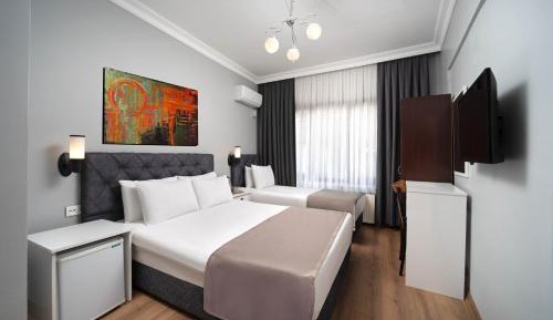 Deluxe Triple Room
